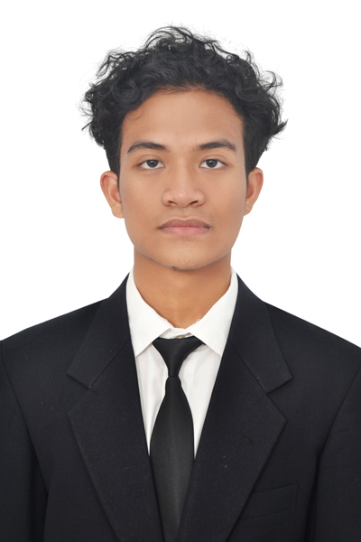 Ibrahim Al Hanif, in a dark suit against a white background.